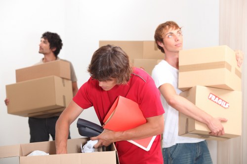 Professional movers loading belongings into a moving truck in Mayfair