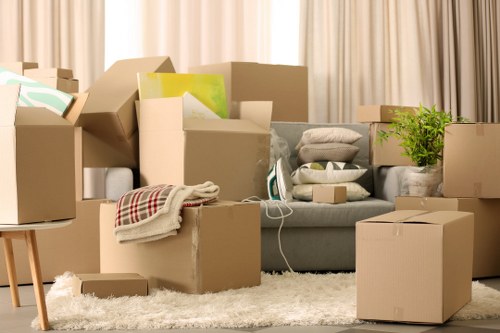 Moving specialists handling valuable furniture in a Mayfair property